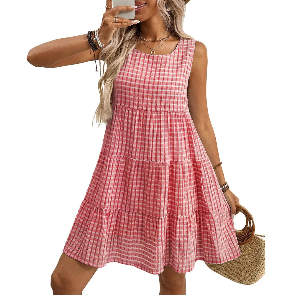 Women's light blue sleeveless plaid dress with oversized swing skirt on a hanger.