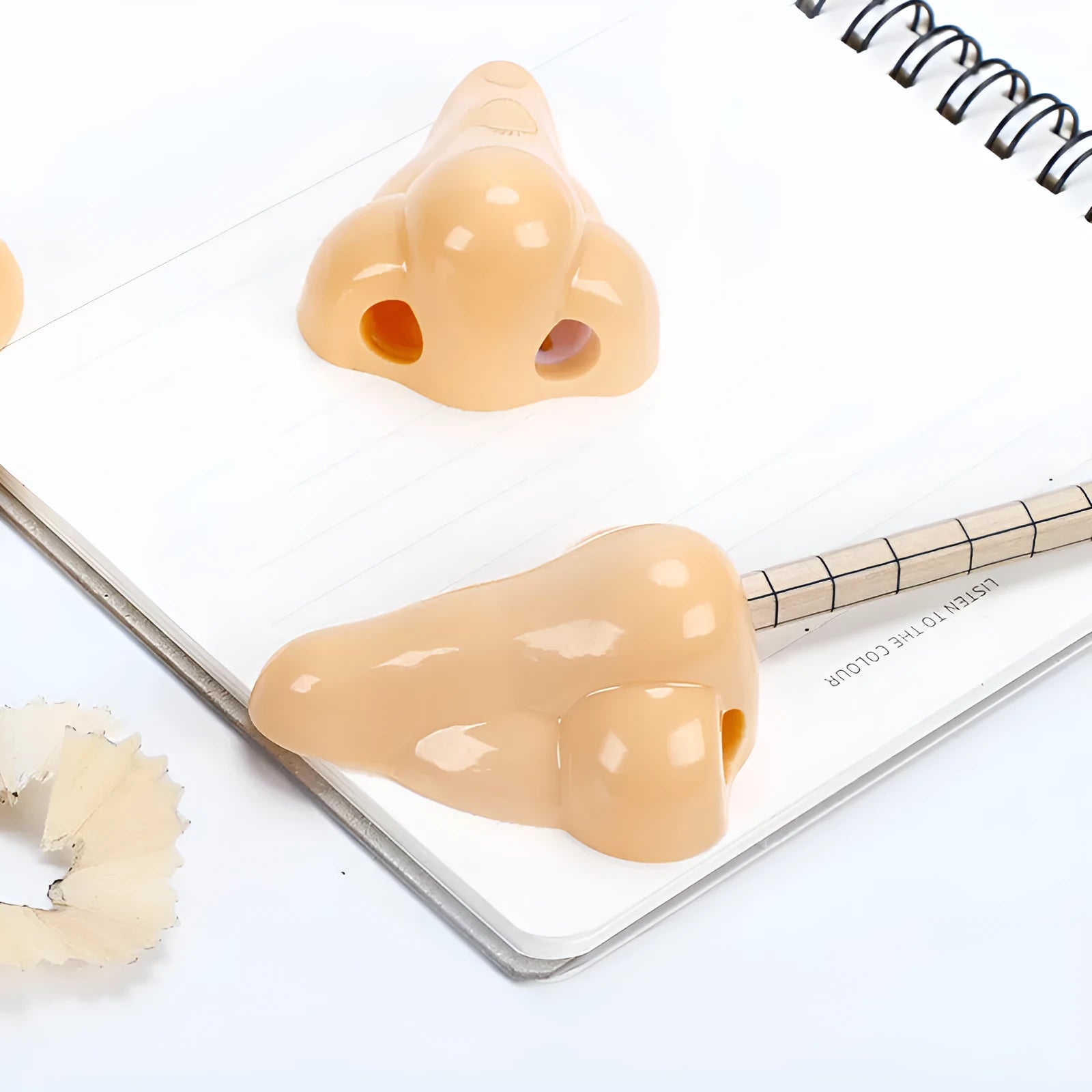 Flesh colour geometry plastic pencil sharpener with big nostril hole for standard pencils
