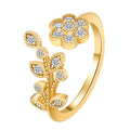 Copper open-ring with diamond-treated floral pattern and leaf details in gold colour