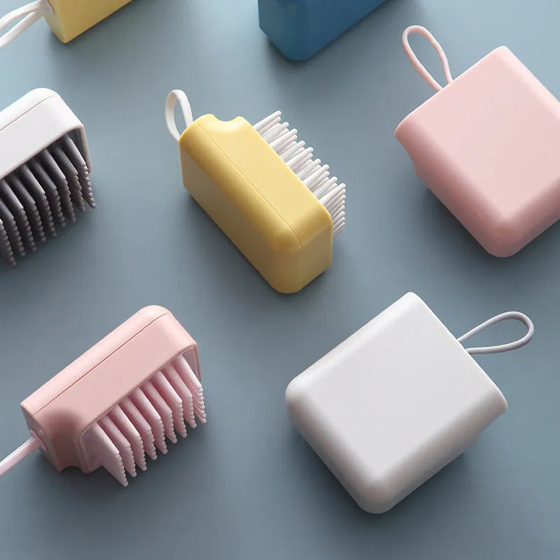 Soft TPR pet bath brush in pink with ergonomic handle for gentle grooming and massage