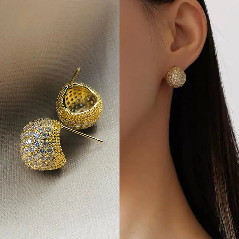 Little Golden Beans geometric drop earrings with full diamond-cut crystal surface and spherical elements
