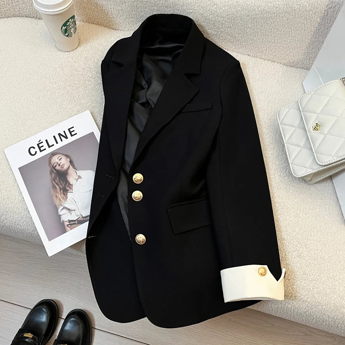 Korean-style loose-fit women's coat in beige and black, showing long sleeves and pockets.