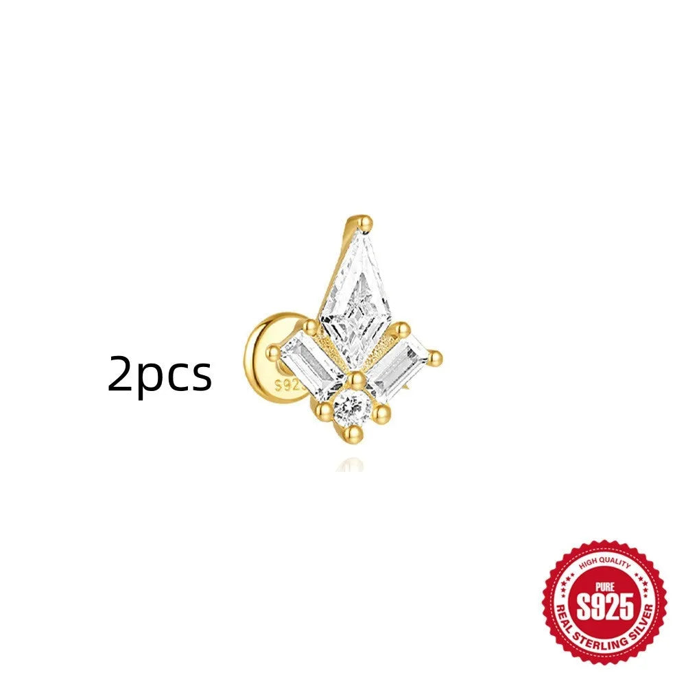 S925 sterling silver geometric kite earring with rhinestones and a chain tassel in a gold colour.