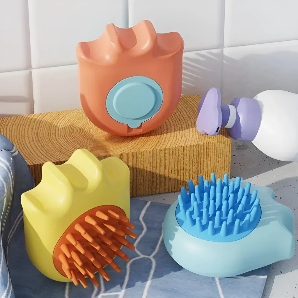 Blue pet bath brush massage comb with integrated shampoo box for washing cats and dogs.