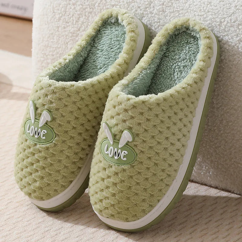 Women's plush rabbit plaid house slipper with thick sole, shown in a solid colour option.