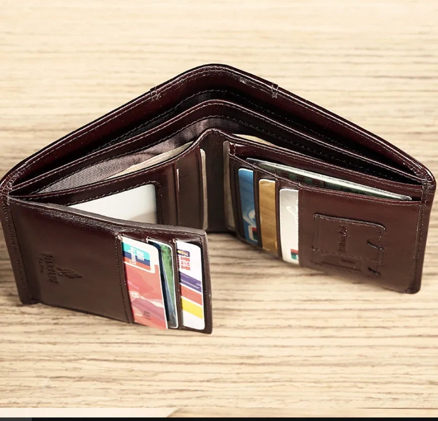 Men's leather wallet showing internal compartments for banknotes, cards, coins, and documents