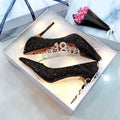 Women's silver and black stiletto wedding shoes with crystal details on a PU leather upper