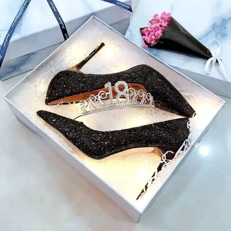 Women's silver and black stiletto wedding shoes with crystal details on a PU leather upper