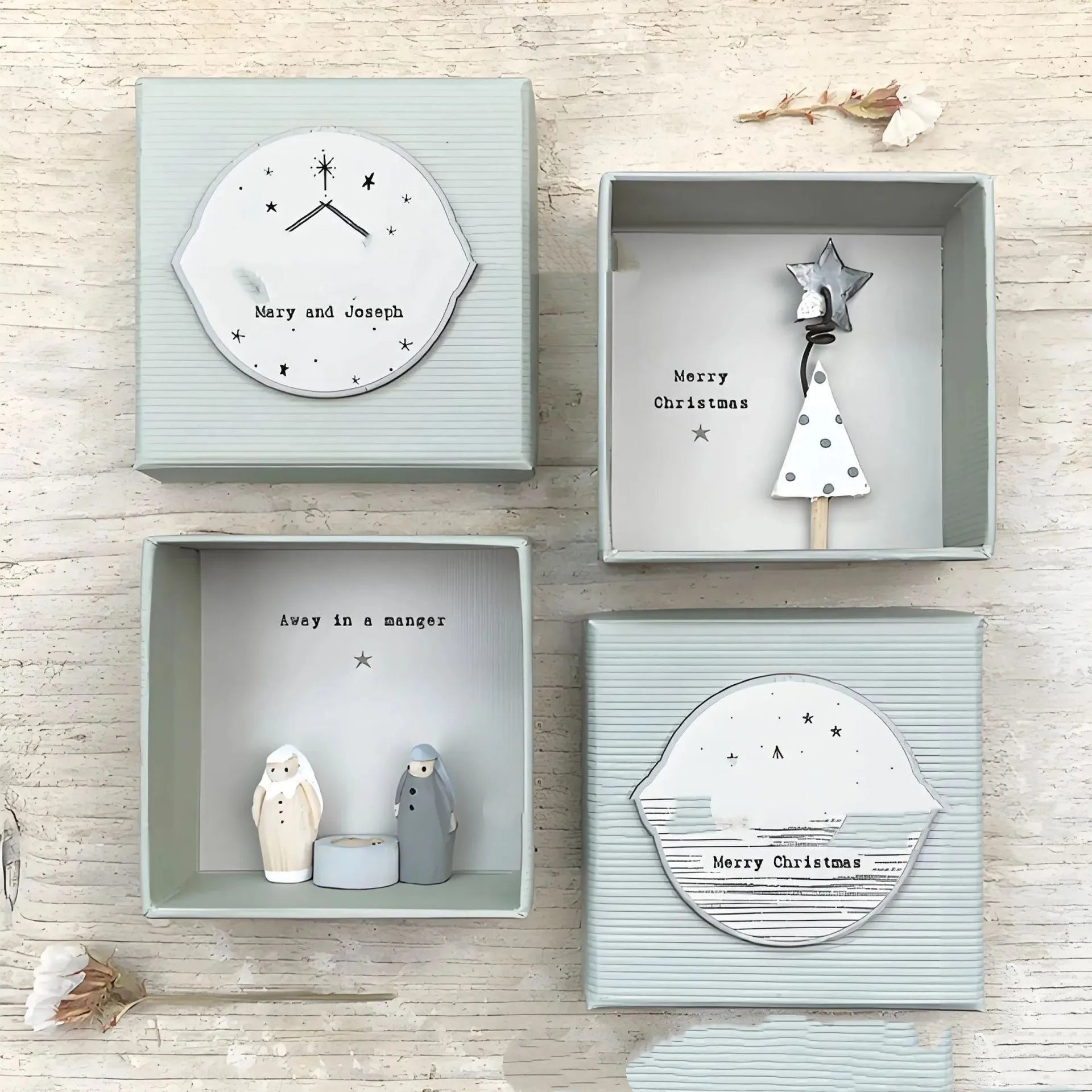 Boxed modern style resin Guardian Angel ornament gift for friends.