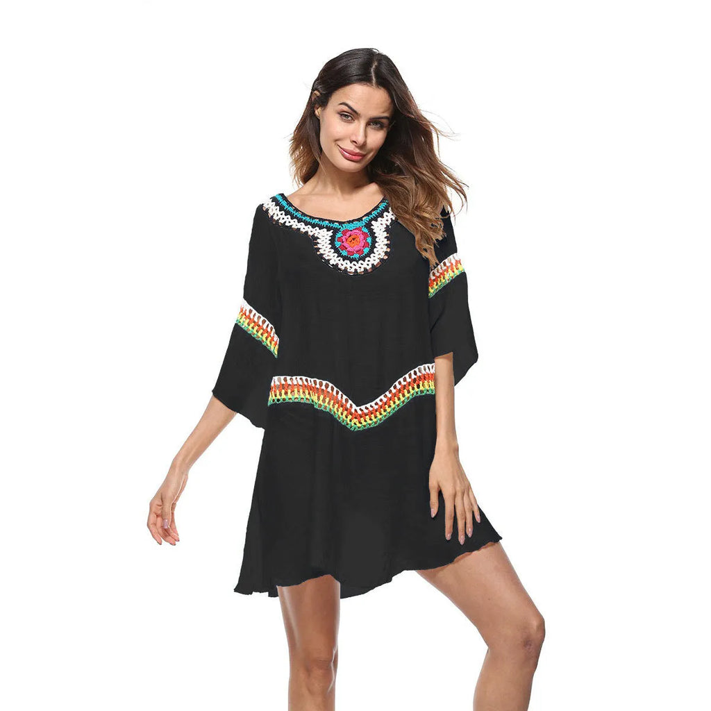 Women's crocheted ethnic style sun protection clothing in apricot colour with beach background