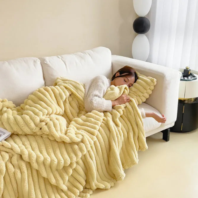 Soft wind bubble velvet faux rabbit fur blanket in a solid colour, showing double-sided thickening texture.
