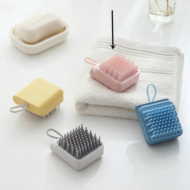 Soft TPR pet bath brush in pink with ergonomic handle for gentle grooming and massage