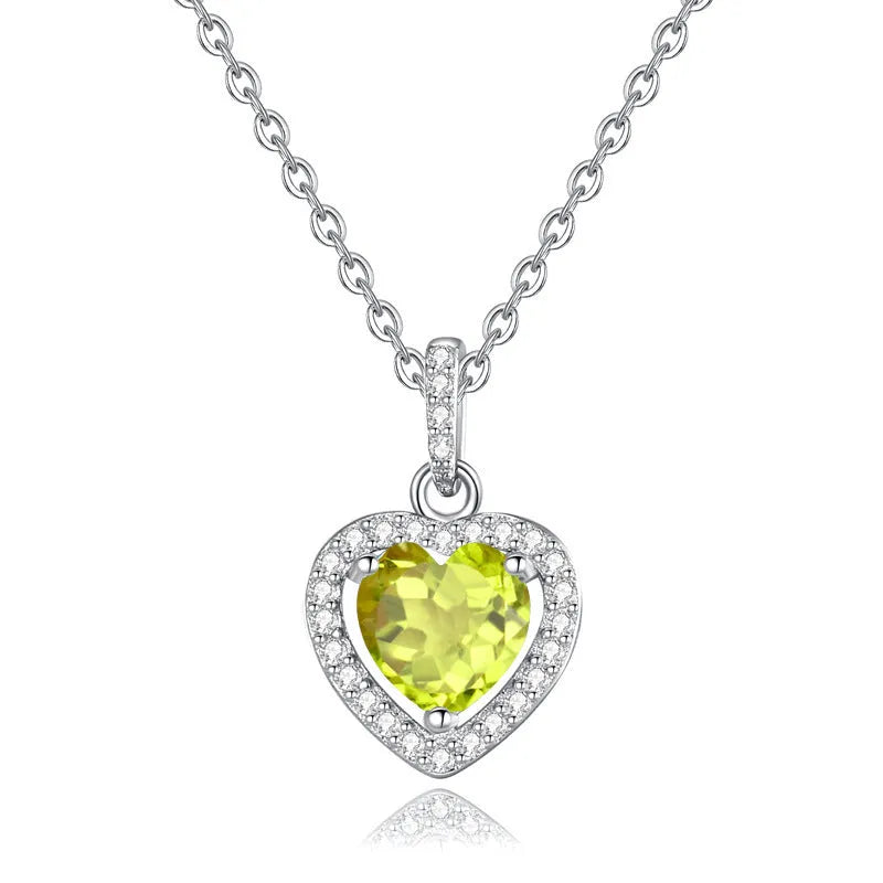 925 silver necklace with heart-shaped pendant containing natural gemstone on cross chain