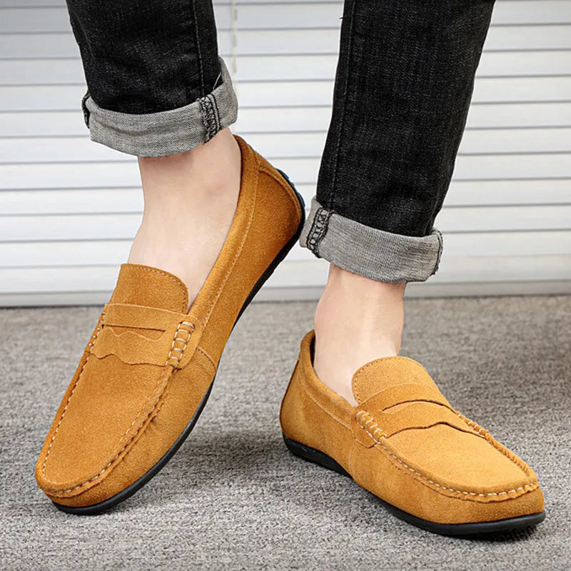 Men's solid colour suede loafers with slip-on design and round toe