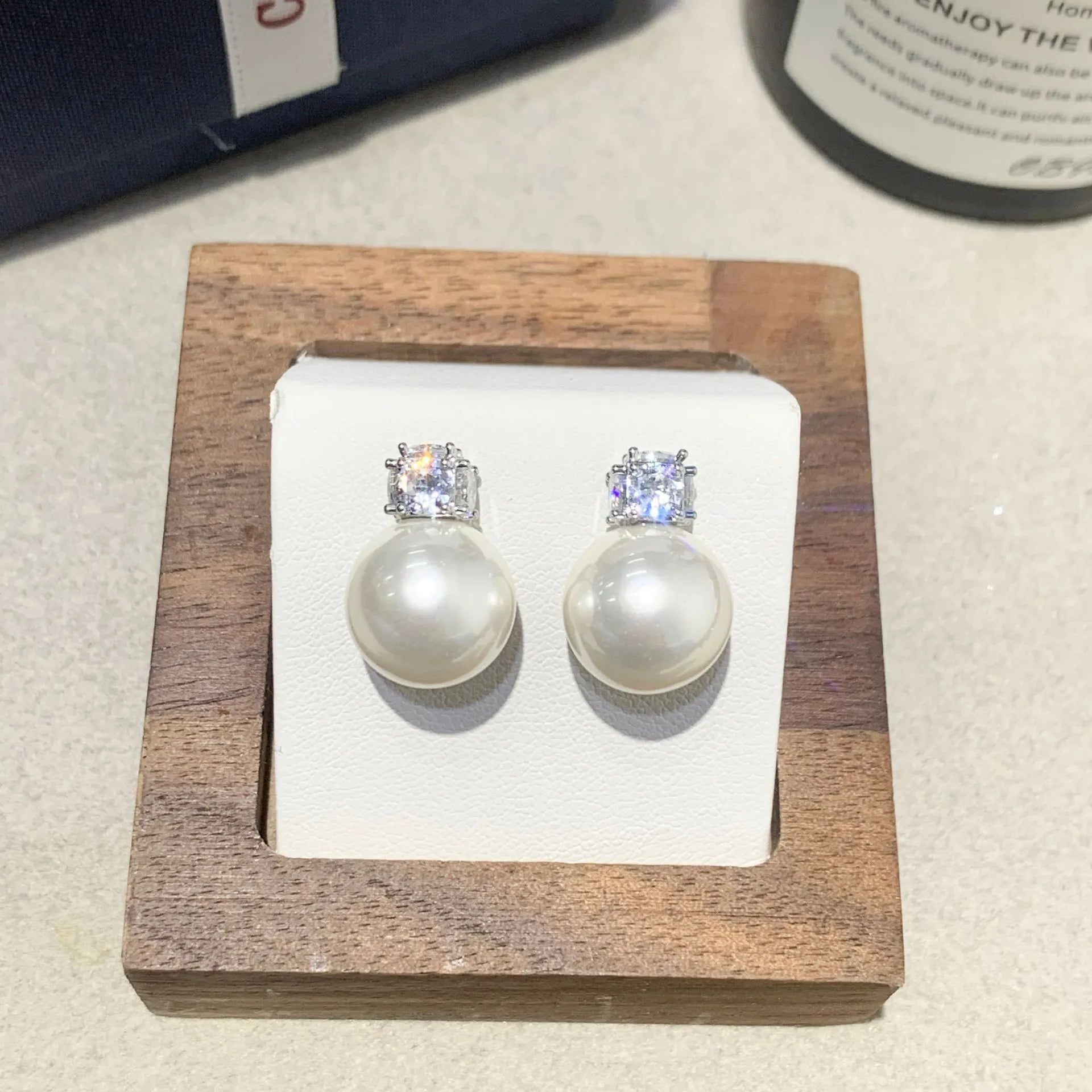 Simple zircon inlaid pearl earrings with faux pearl and cubic zirconia dangle on metal alloy, 2.5cm length, three style options