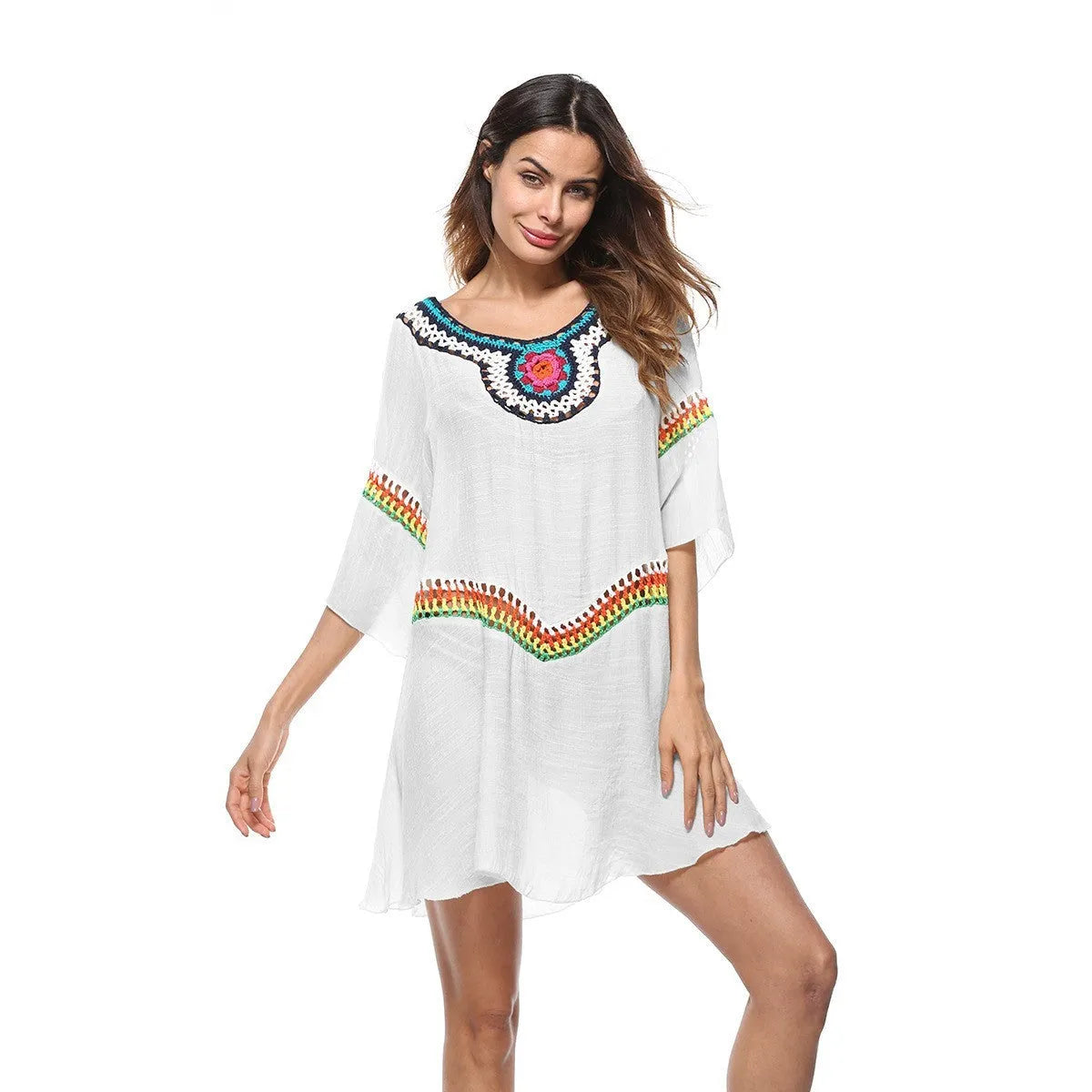 Women's crocheted ethnic style sun protection clothing in apricot colour with beach background