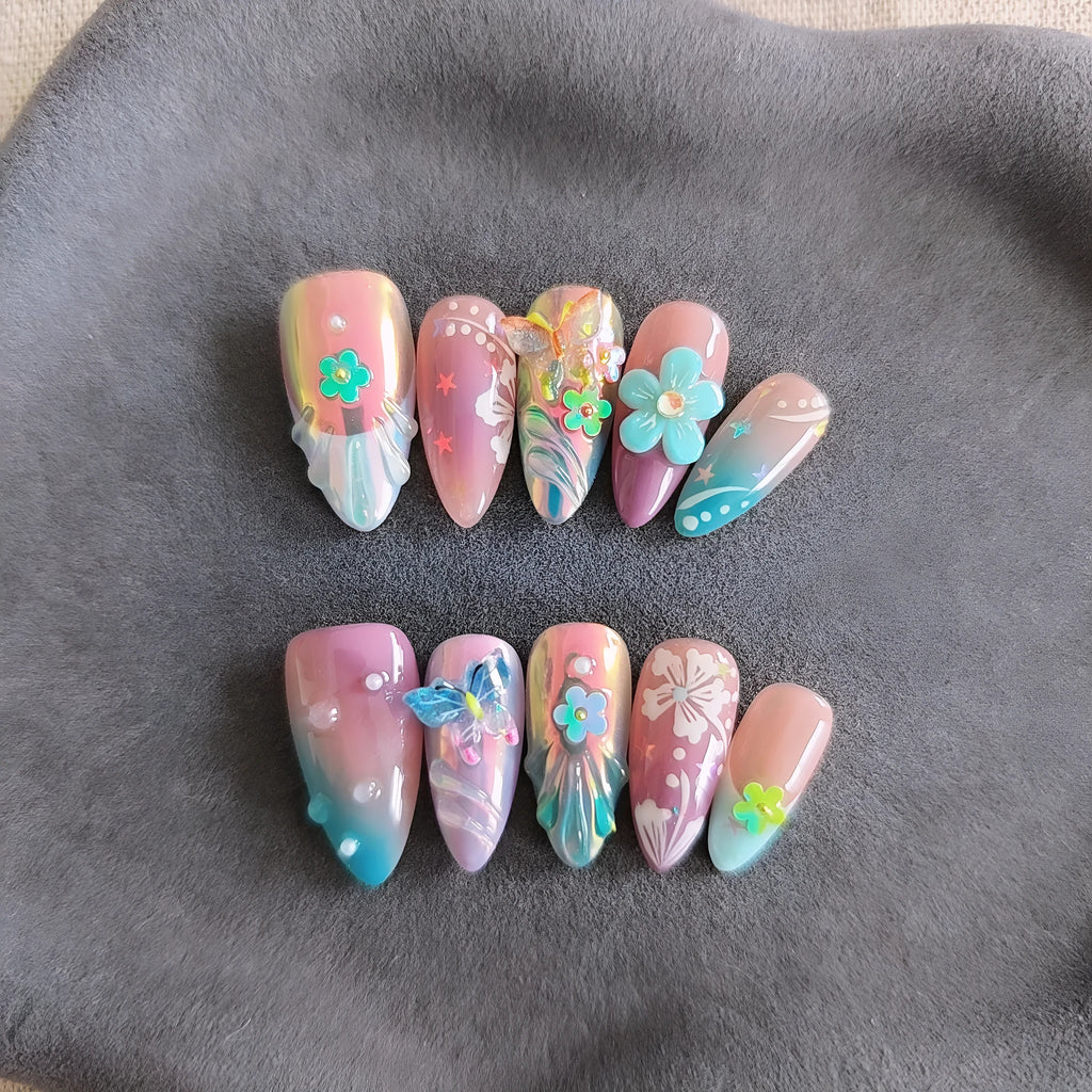 Handmade floral and butterfly nail sculpture charms in four sizes for almond nail art