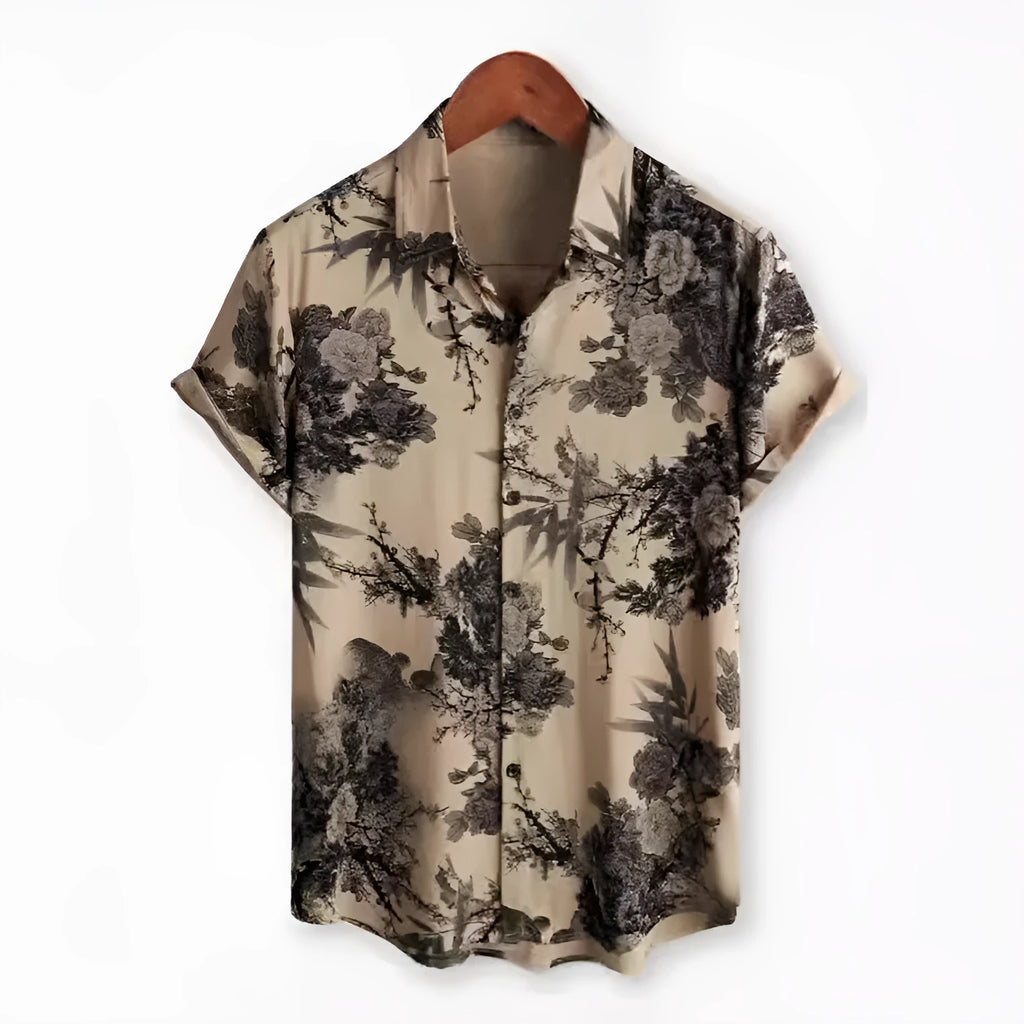 Man wearing a short sleeve floral Hawaiian shirt with lapel collar, made from elastic polyester fabric.