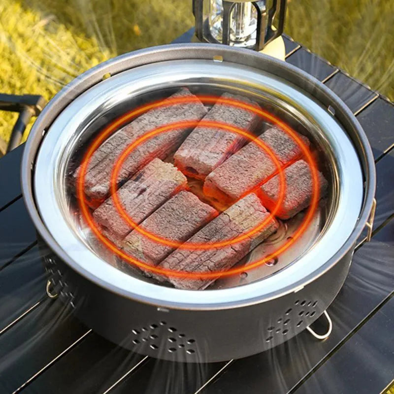 Portable stainless steel charcoal barbecue grill with detachable legs and storage bag