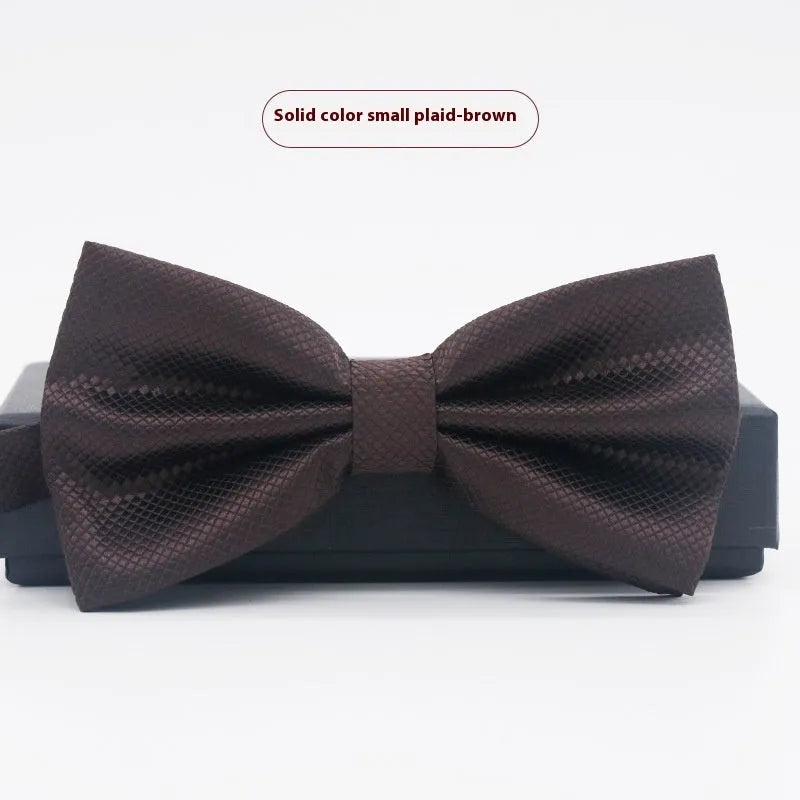 Solid colour flat head bow tie for formal wear in multiple colours including black, red, and blue.