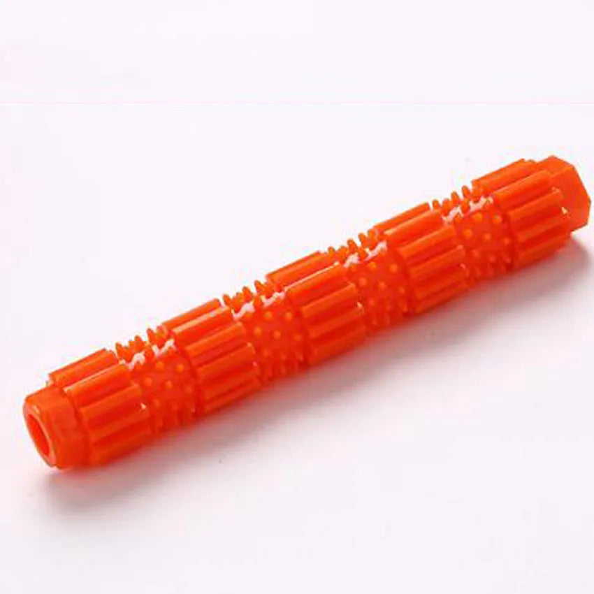 Green and orange durable rubber dog chew toy with squeaker and treat-dispensing hole.
