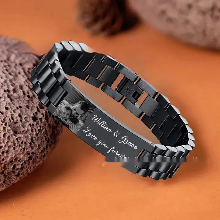 Titanium steel bracelet with curved heart-shaped piece featuring black lettering design