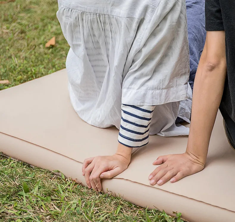 Inflatable camping mattress 2.5cm thick polyester and foam floor mat in apricot colour for outdoor use