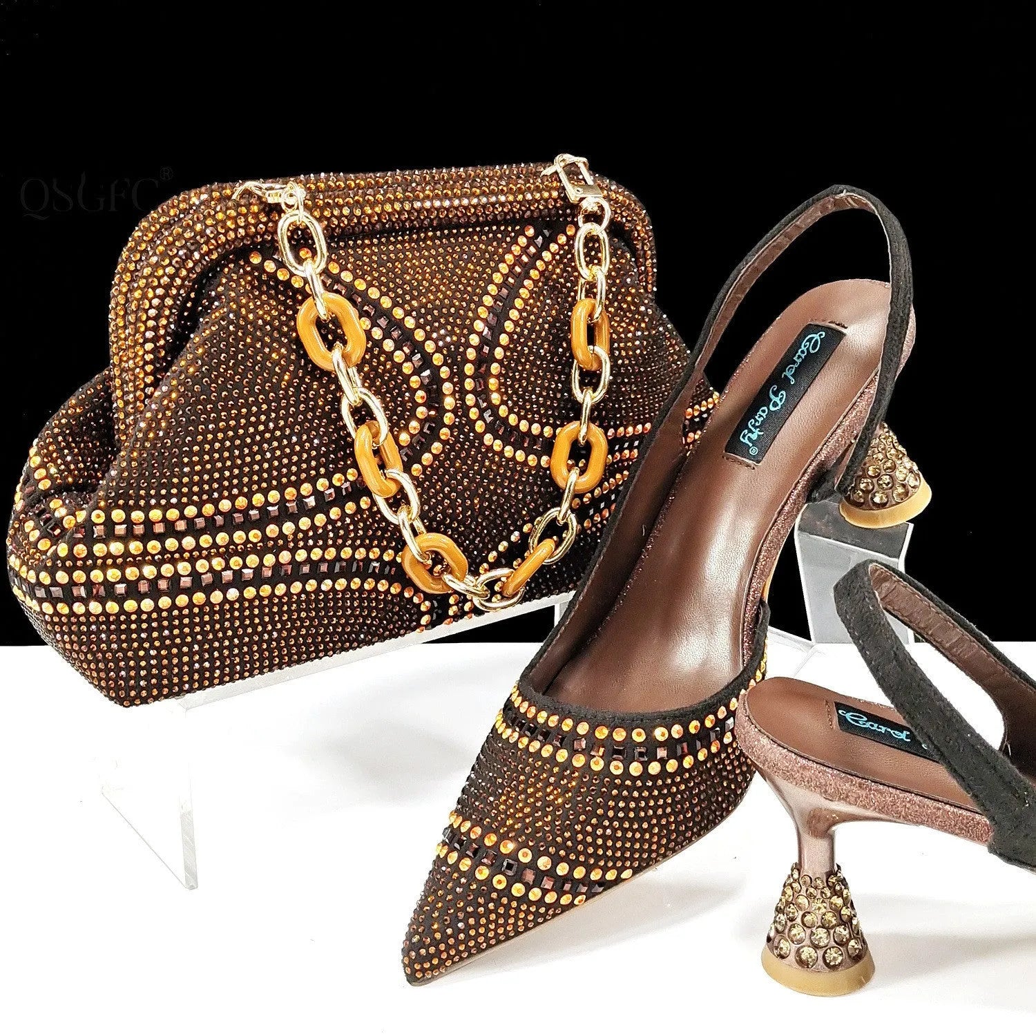 Women's pointed toe high heel shoes with rhinestone decoration and matching small bag in synthetic leather