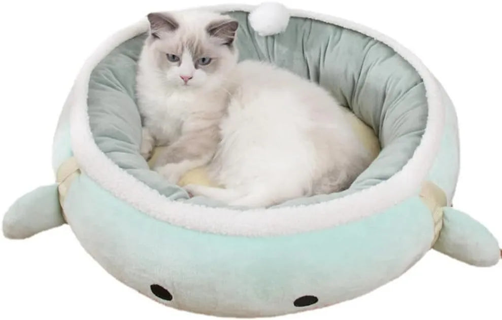 Green chick-shaped cat bed that can be used flat or hung as a hammock for small pets.