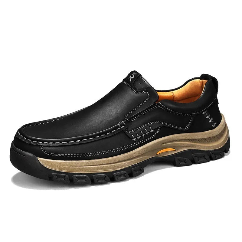 Men's black thick-soled mountaineering boots with round toe and rubber sole.