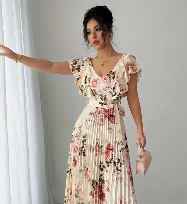 Apricot floral print women's dress with V-neck, ruffled sleeves, and oversized swing skirt