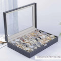 Grey high-grade leather watch storage box with dustproof see-through lid showing multiple watch compartments