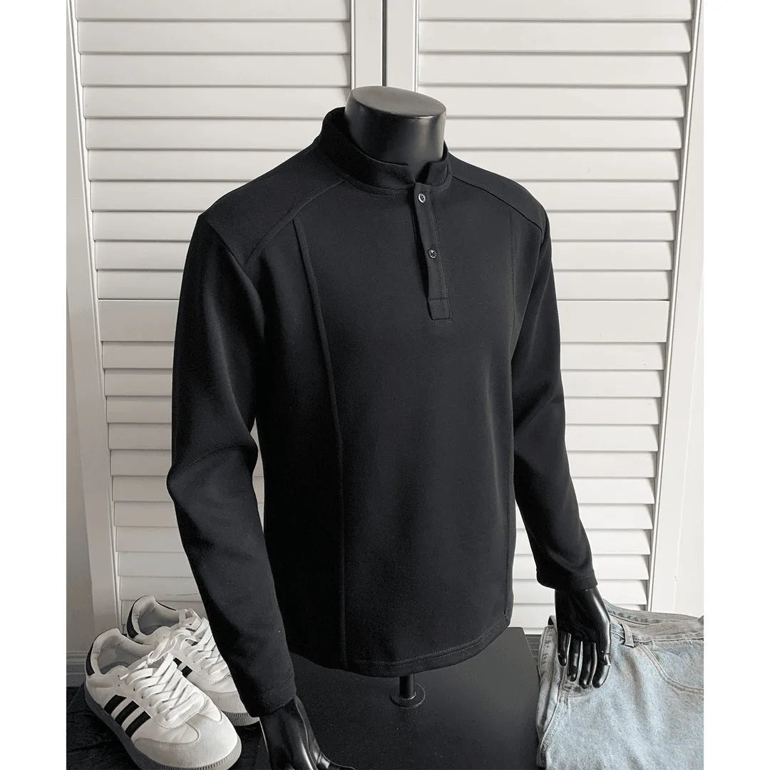 Men's grey asymmetrical stand-up collar cotton polo shirt with patchwork shoulder detail.