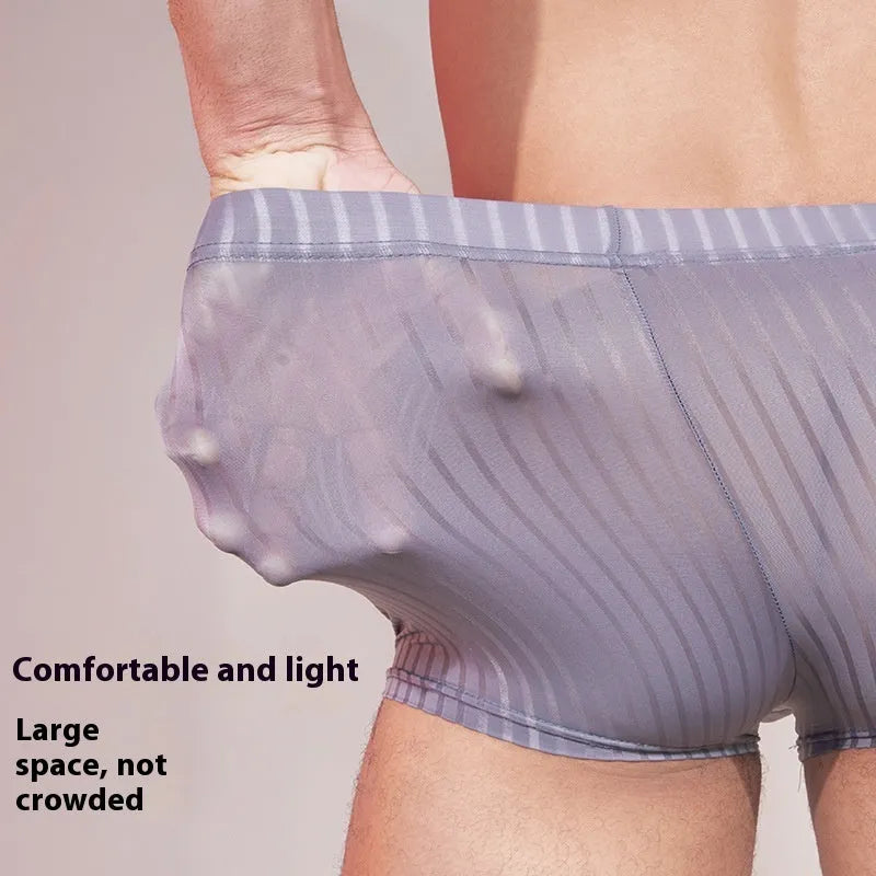 Men's striped underwear in thin transparent nylon fabric, shown in black, dark grey, and white colours.