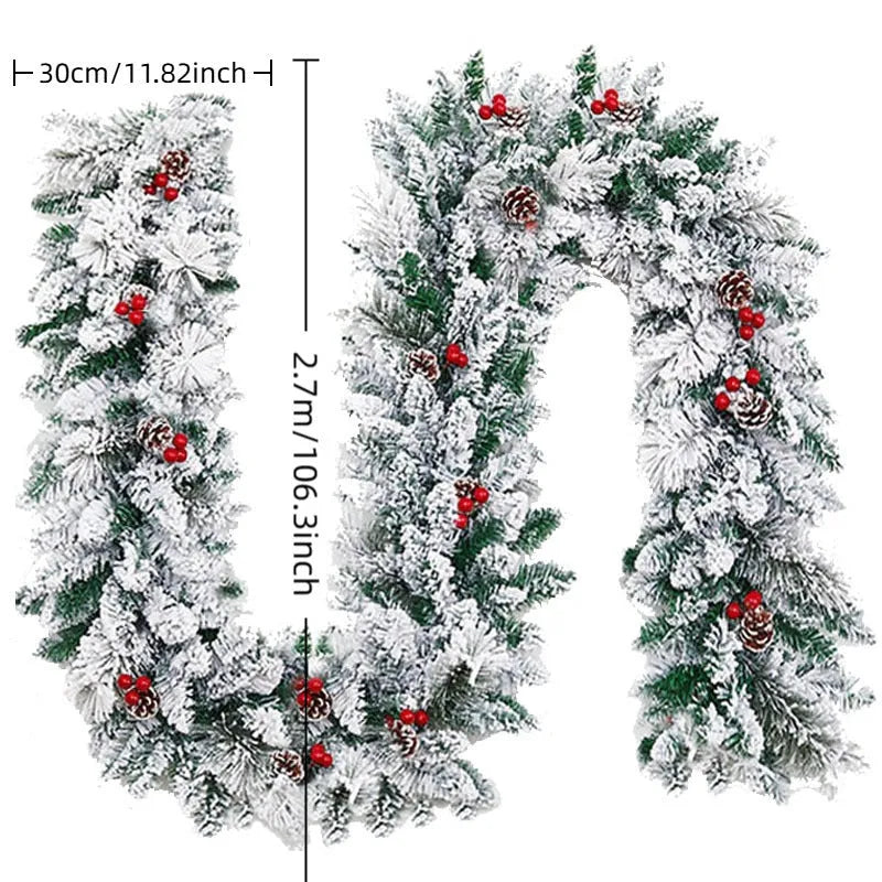 White snow flocked rattan Christmas garland draped decoratively with PVC construction