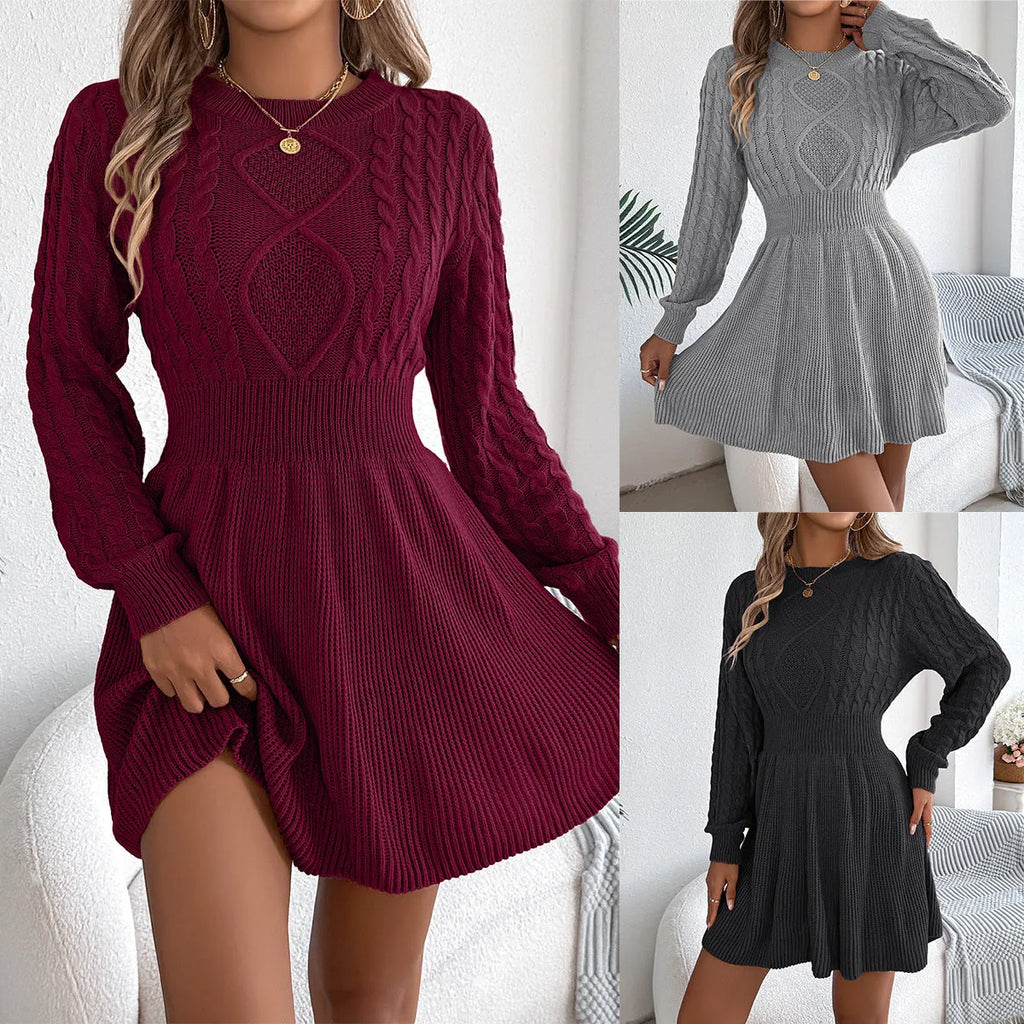 Long sleeve black sweater dress with lantern sleeves and an elastic waist, midi length.