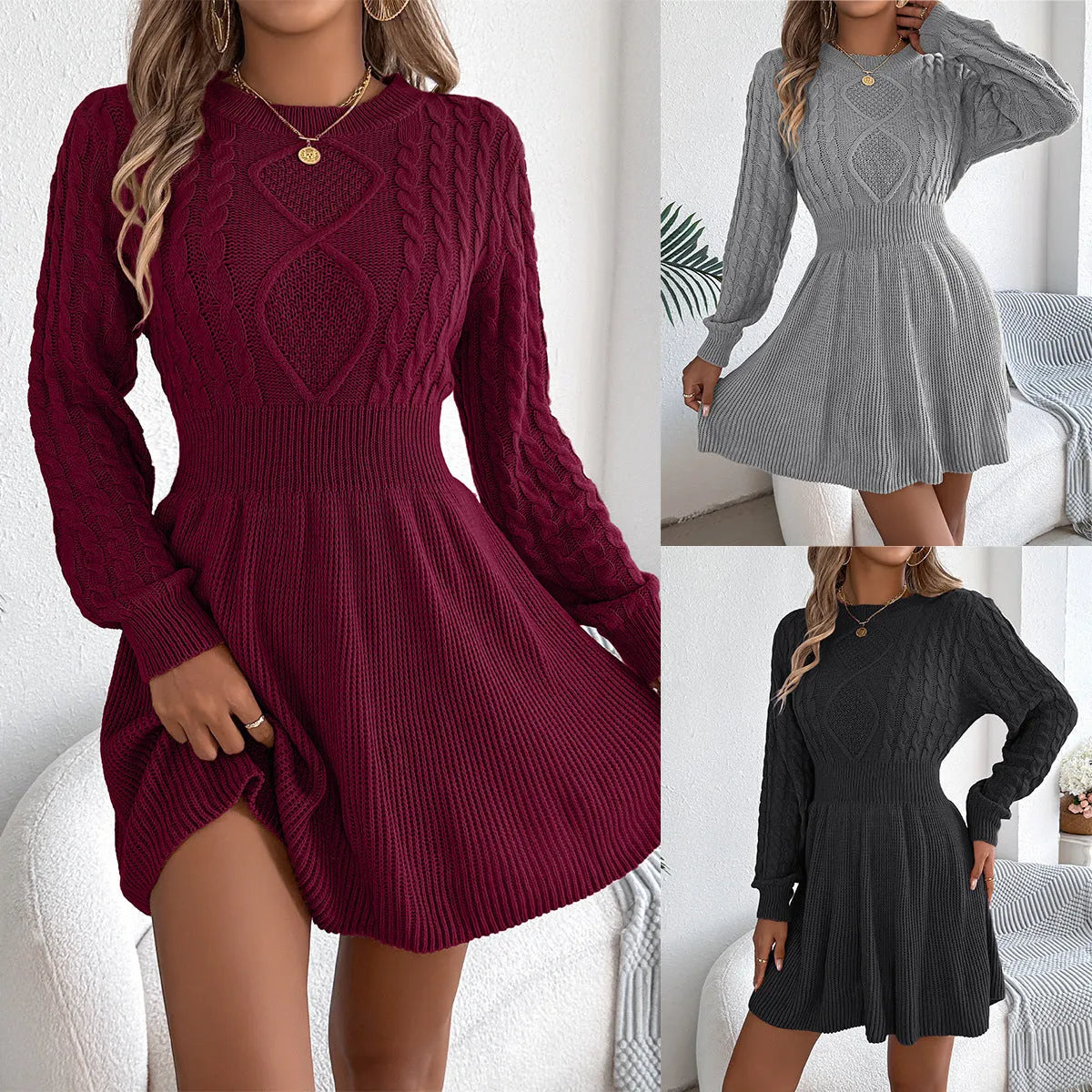 Long sleeve black sweater dress with lantern sleeves and an elastic waist, midi length.