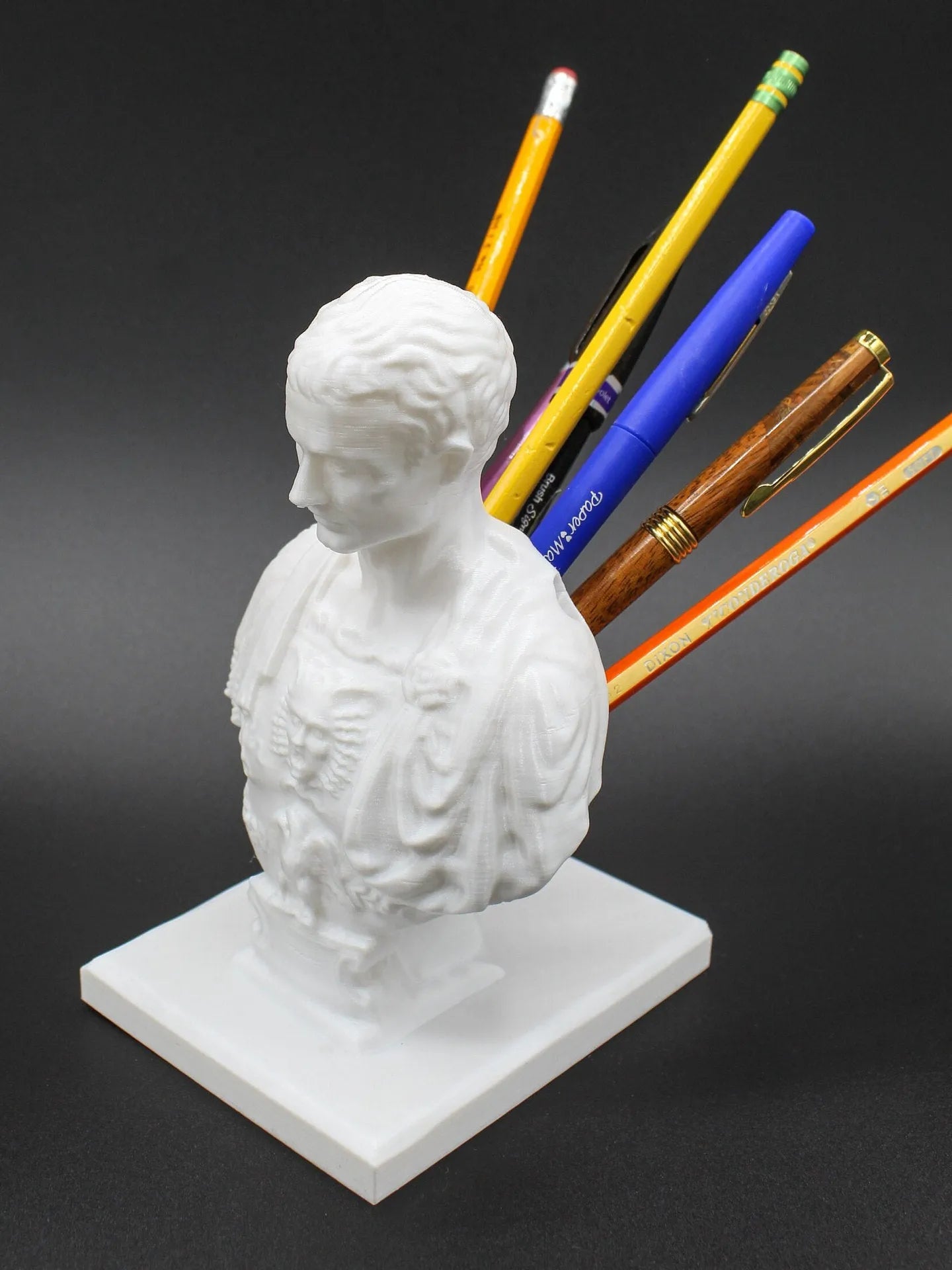 White American creative character modelling pen holder made from synthetic resin for desk organisation