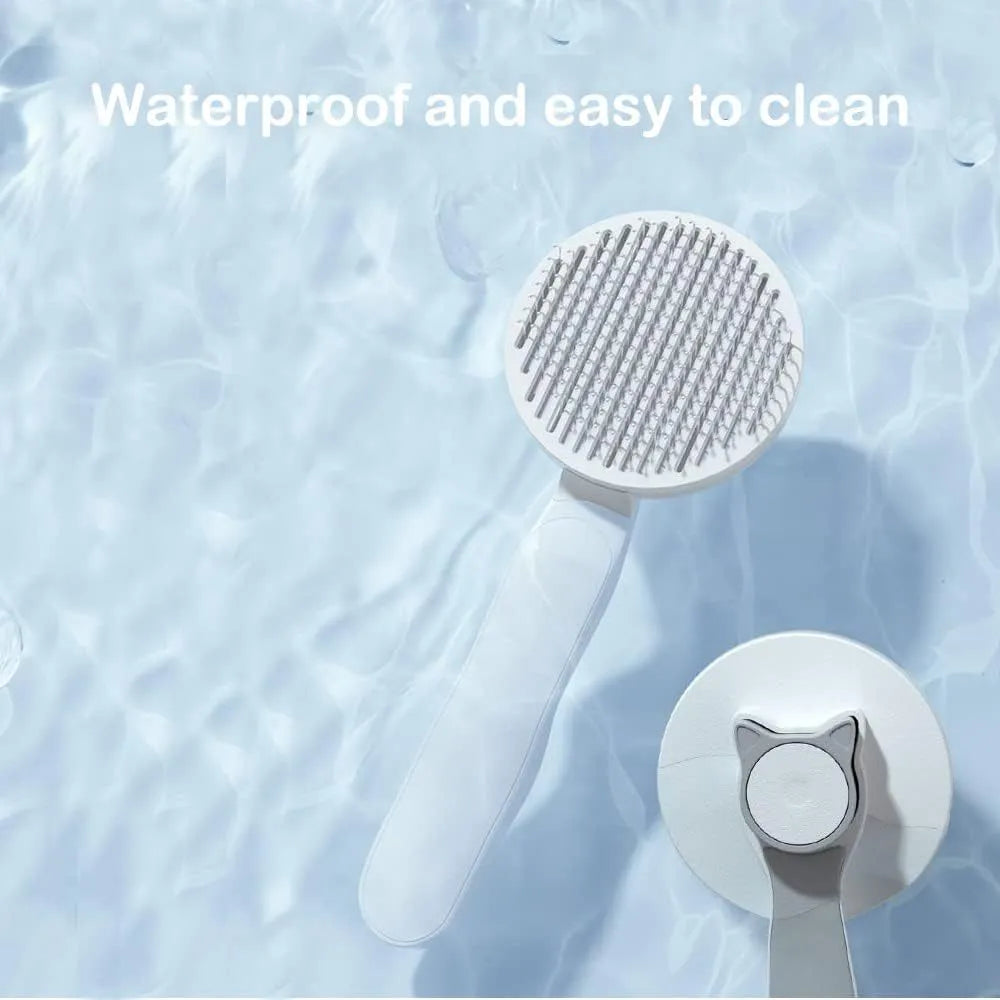 Blue self-cleaning pet grooming brush with rubber handle and metal pins with rubber tips.