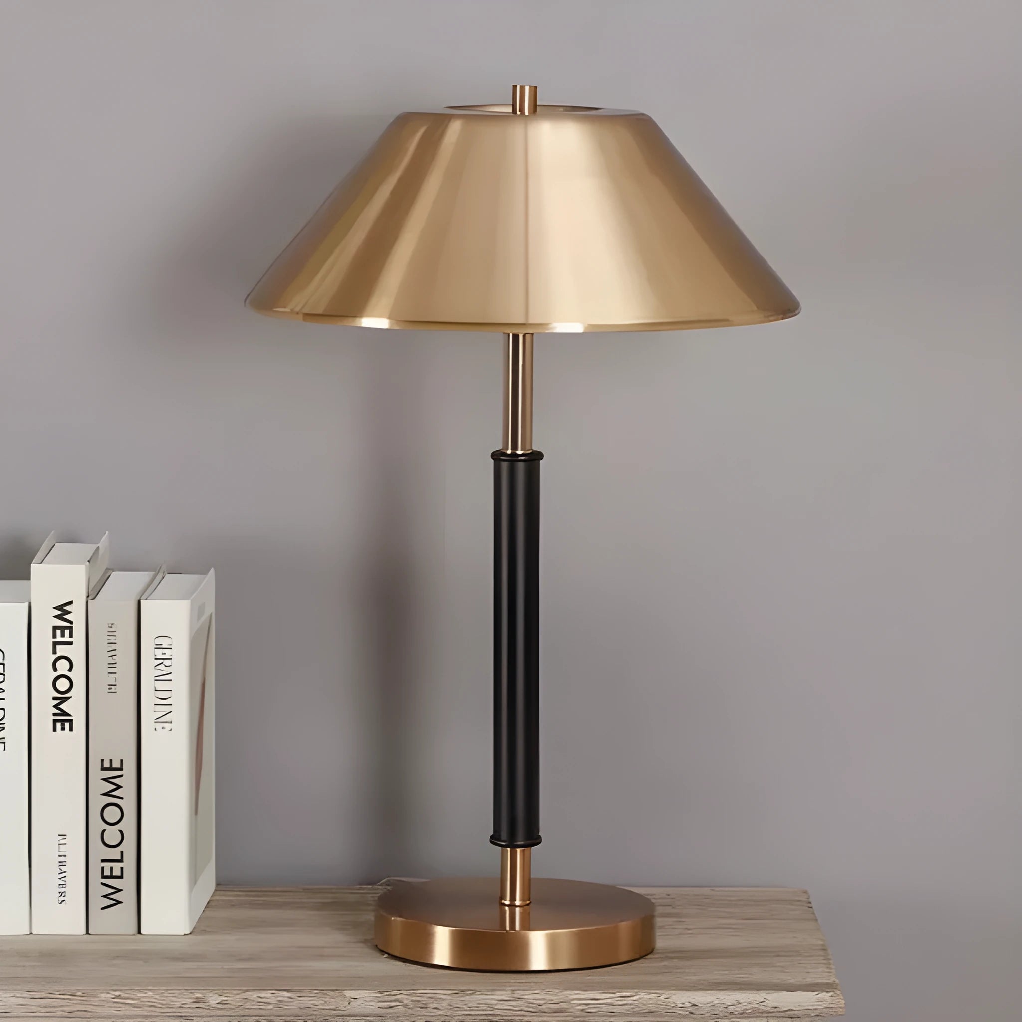 Post-modern metal bedside lamp with antique copper finish on a bedside table