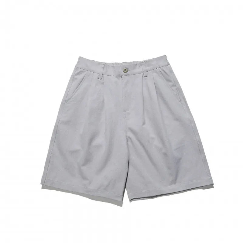Loose straight drooping suit shorts in light grey, front view, with micro-elastic waist and retro style