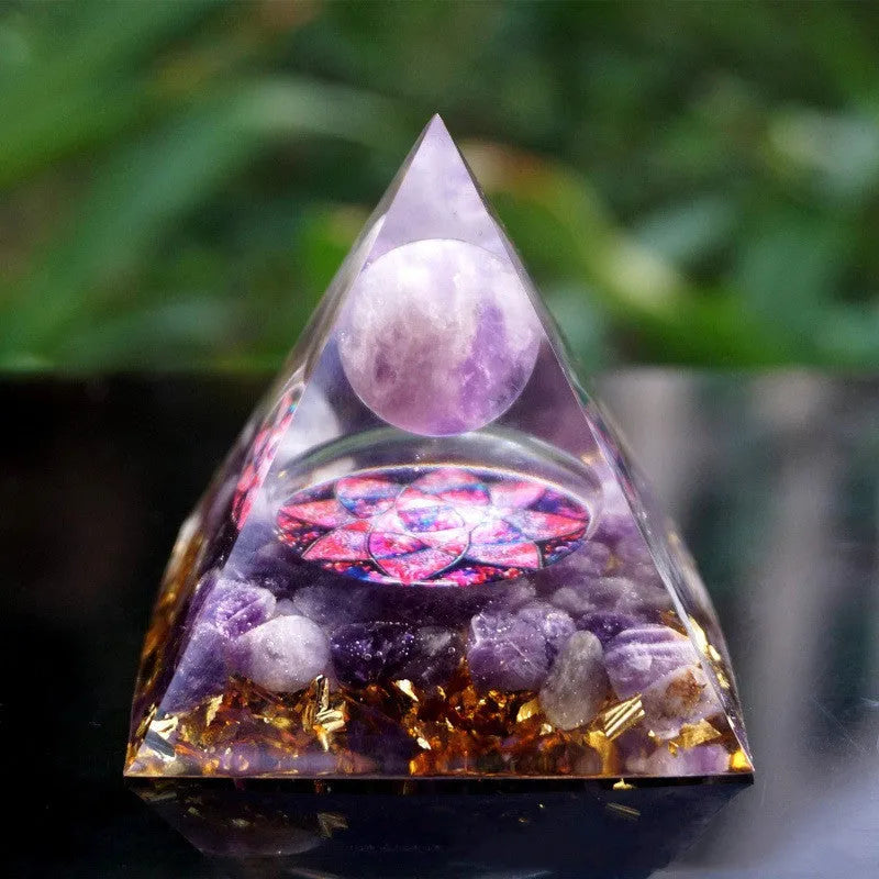 Clear epoxy resin pyramid ornament with embedded blue lapis lazuli crystal gravel, 6cm tall.