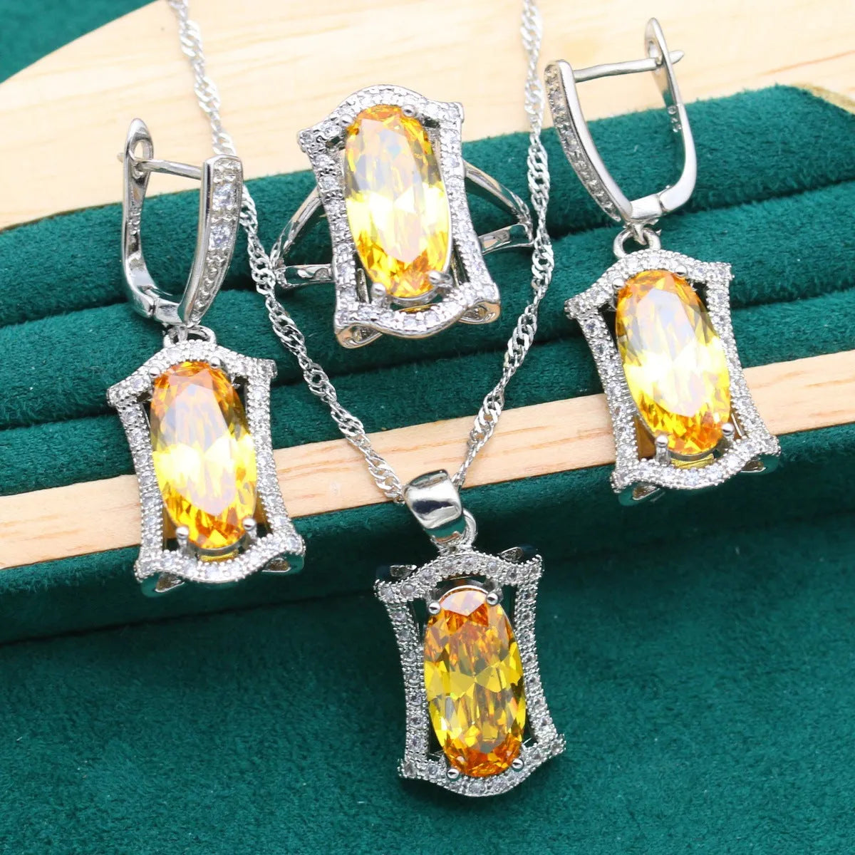 Olive and yellow anti-allergy zircon alloy jewellery set for women, showing necklace, earrings, ring, and bracelet.