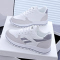 Women's lightweight running sports shoes in white and gray with lace-up front and PU outsole