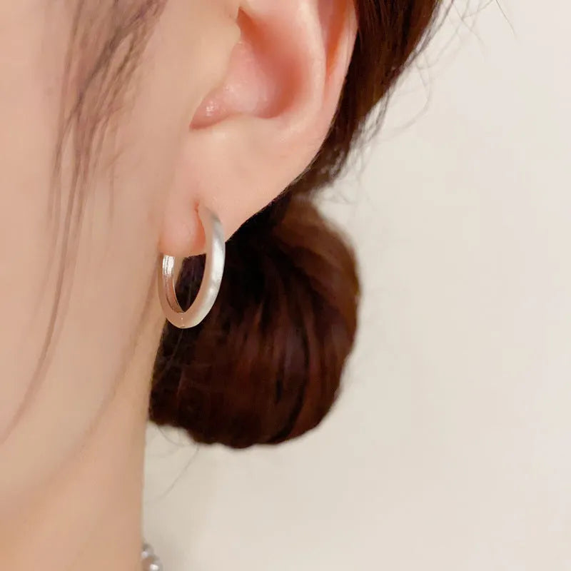 Geometric round gold plated ear clip on copper base with clip fastening
