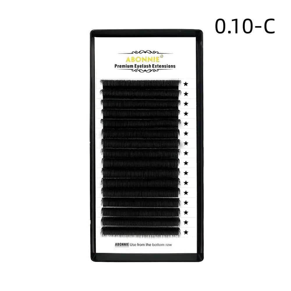 Pair of dense 16-row false eyelashes made from matte wool mink hair, showing voluminous length.