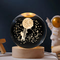 Illuminated crystal ball on wooden base with USB cable for desktop decoration