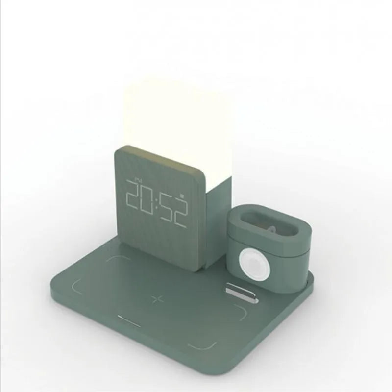 Dark green 3-in-1 wireless charging stand for phone, watch, and earbuds on a wooden table.