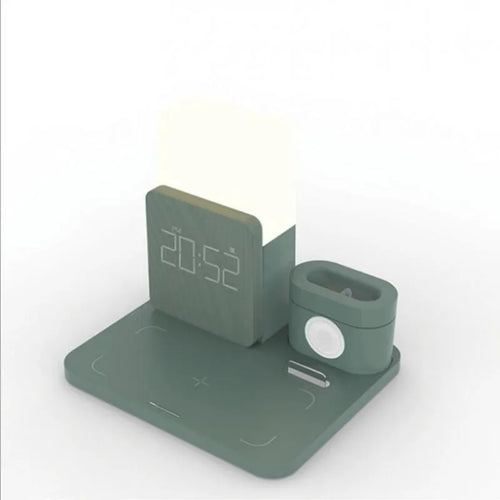 Dark green 3-in-1 wireless charging stand for phone, watch, and earbuds on a wooden table.