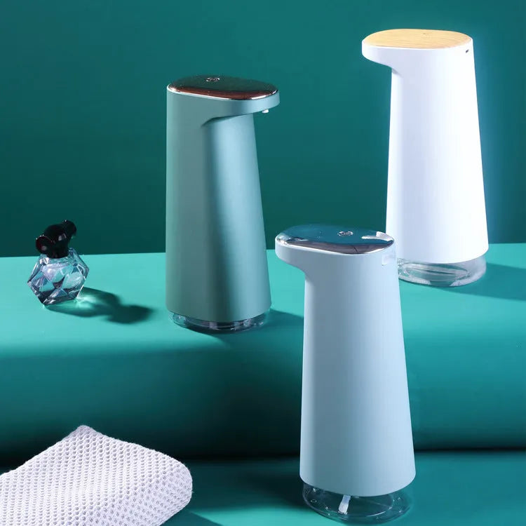 Automatic foam soap dispenser in white with infrared sensor, USB charging port, and compact desktop design
